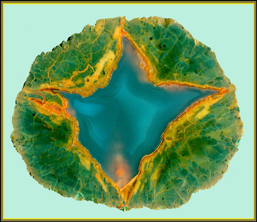 "Звёздчатый" агат в литофизе из риолитов, 10см. Фото/коллекция В.Слётов.